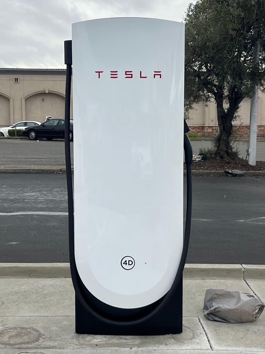 Close crop of a Tesla V4 dispenser with payment hardware