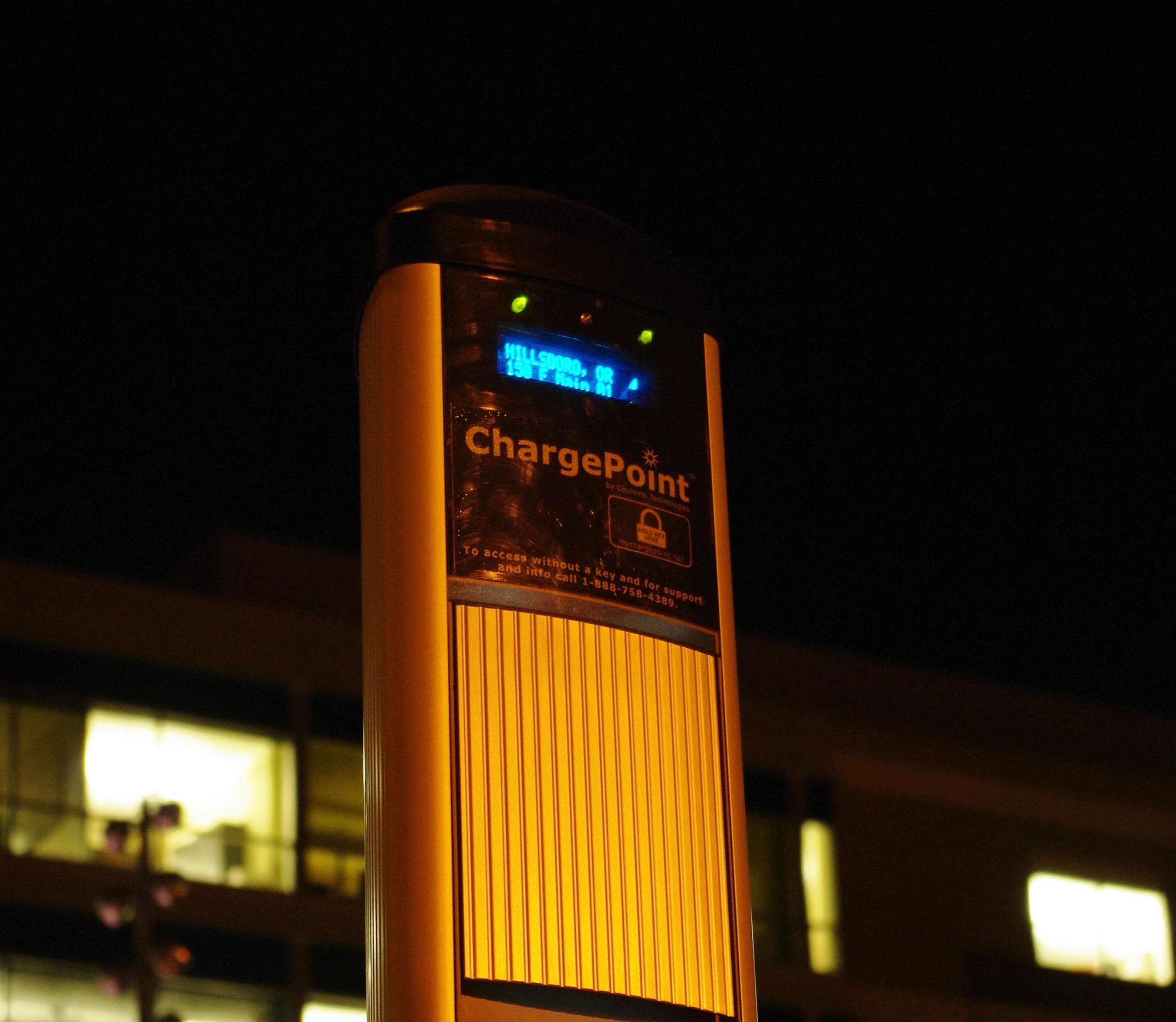 ChargePoint terminal illuminated at night in Hillsboro, Oregon