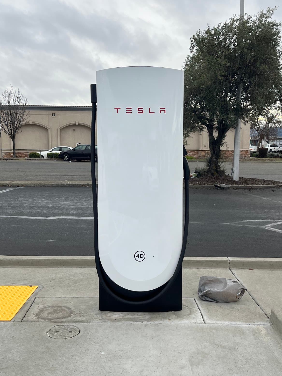 Tesla V4 Supercharger dispenser with card reader.