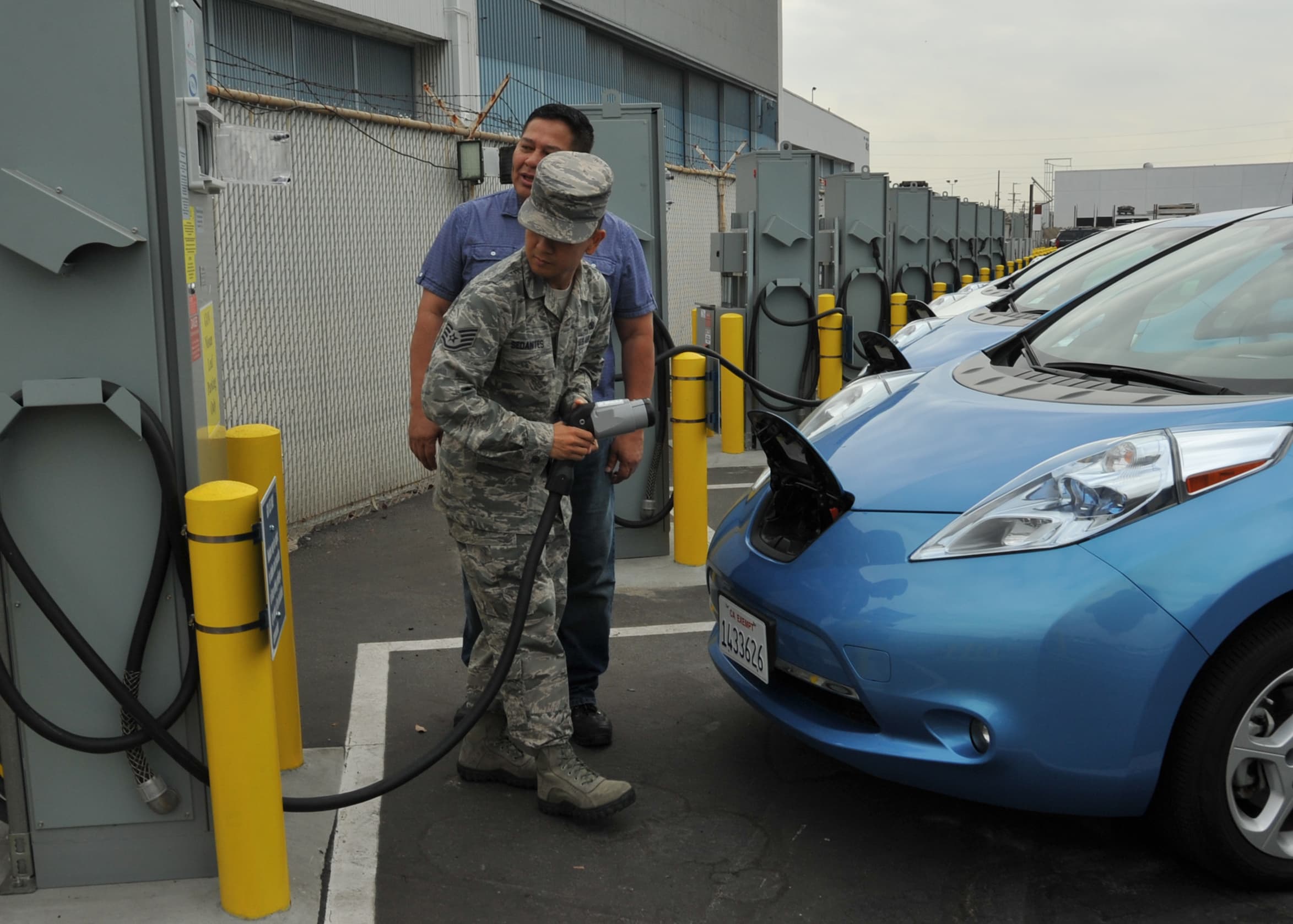 U.S. Air Force EV chargers with bidirectional program notes.