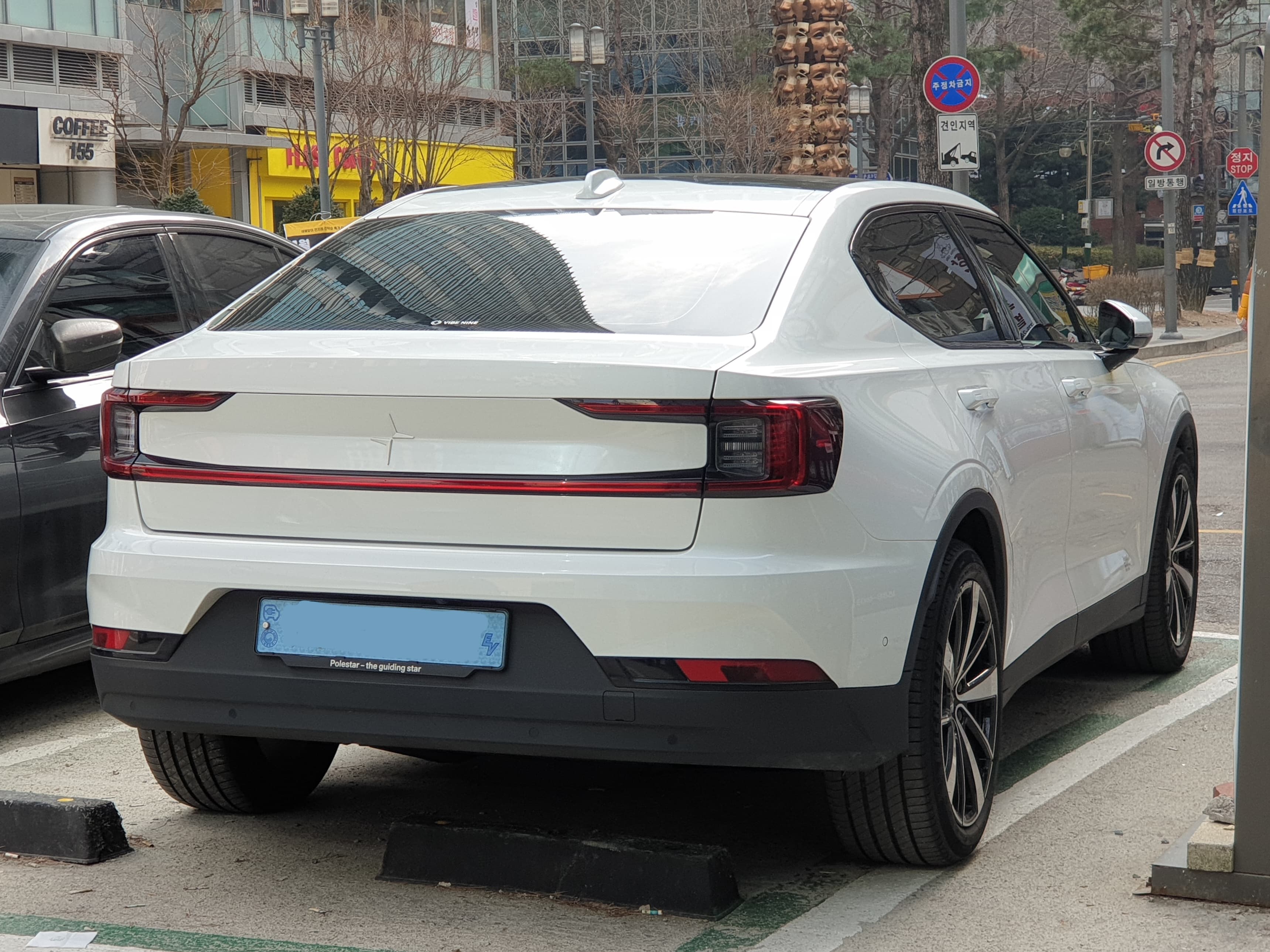 Polestar 2 parked in fresh snow on a cold winter day